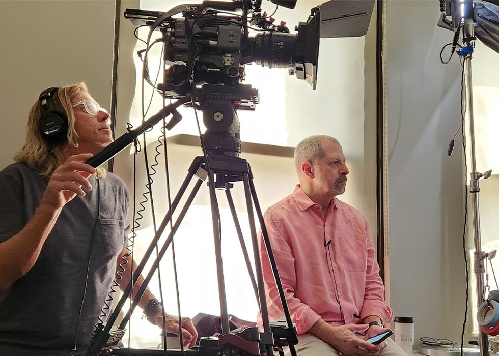 The AI Decoded documentary team filming an interview